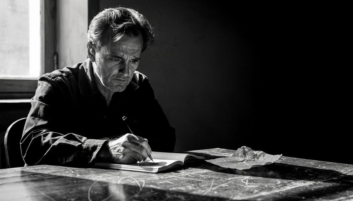 Man preparing notes for conversation pre-mortem about toxic traits