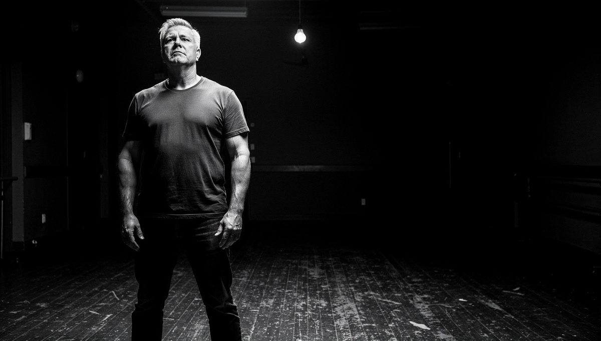 Man practising confident posture using confidence competence loop training
