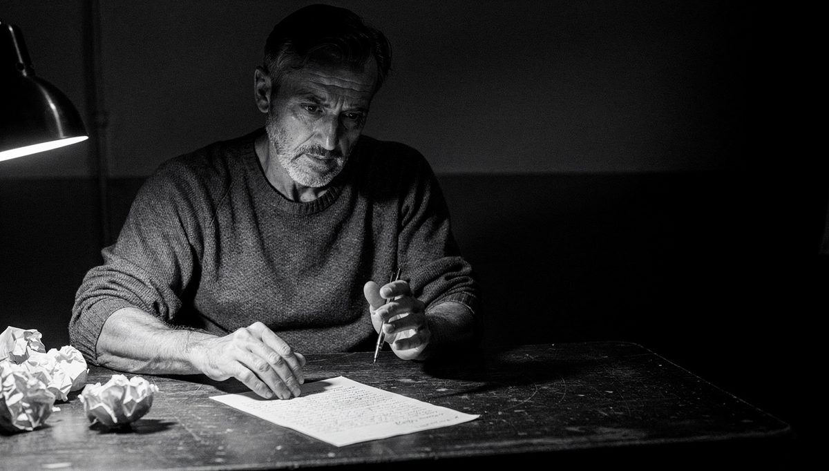 Man preparing M.A.S.T.E.R. method feedback notes at desk