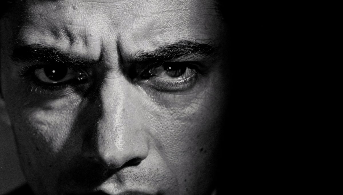 Close-up of furrowed brow and focused gaze interpretation muscles